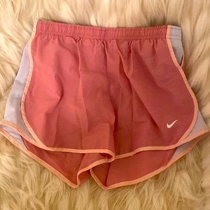 (DISTRESSING IS PART OF DESIGN) Nike girls Tempo active shorts.